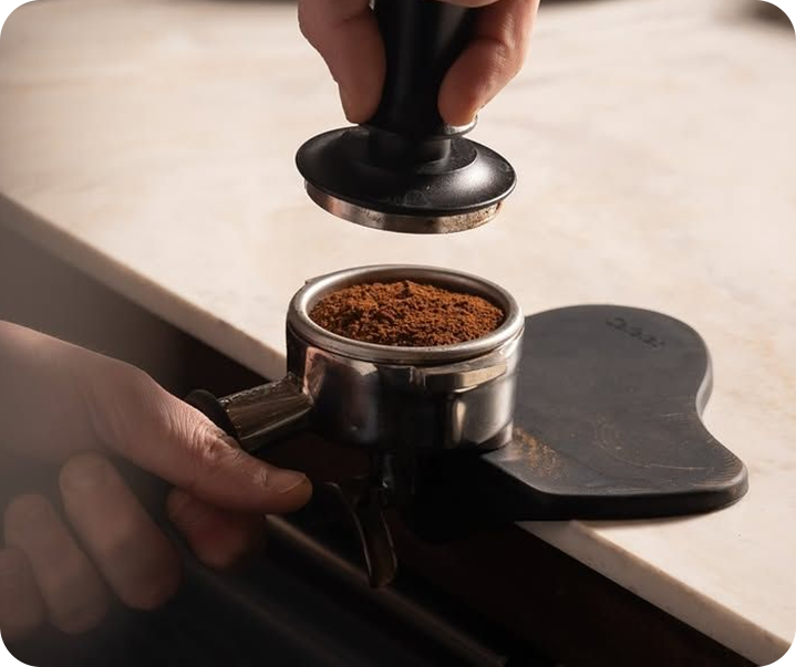 Barista preparing a shot of espresso